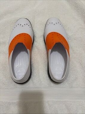 Women’s White and Orange Slip-On Spikeless Golf Shoe
